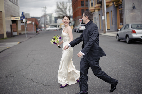 the happy couple walking down the street - wedding photo by top Portland, Oregon wedding photographer Aaron Courter